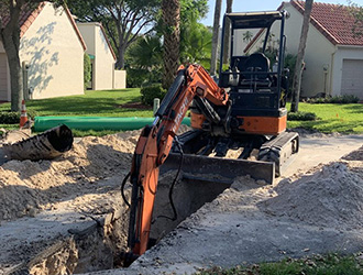 Small excavator trenching