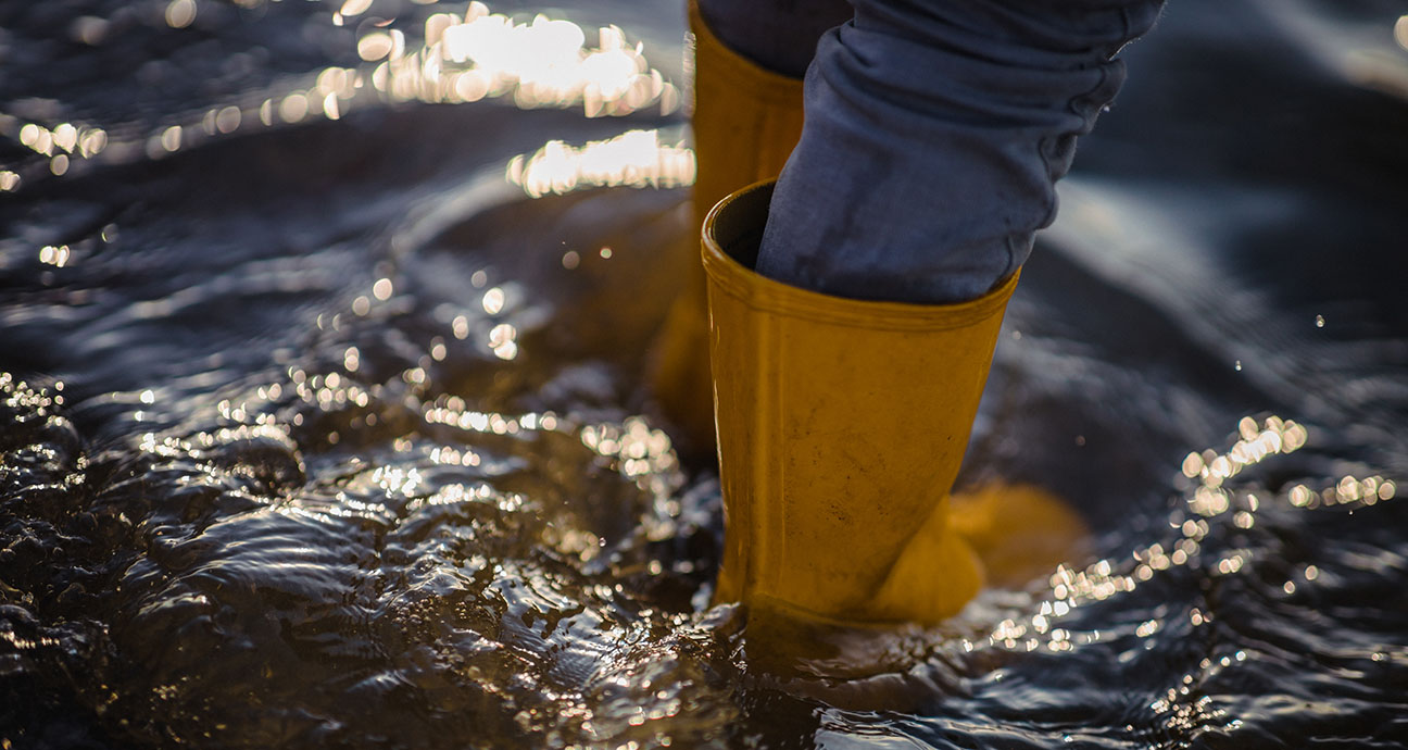 flooding man's boots